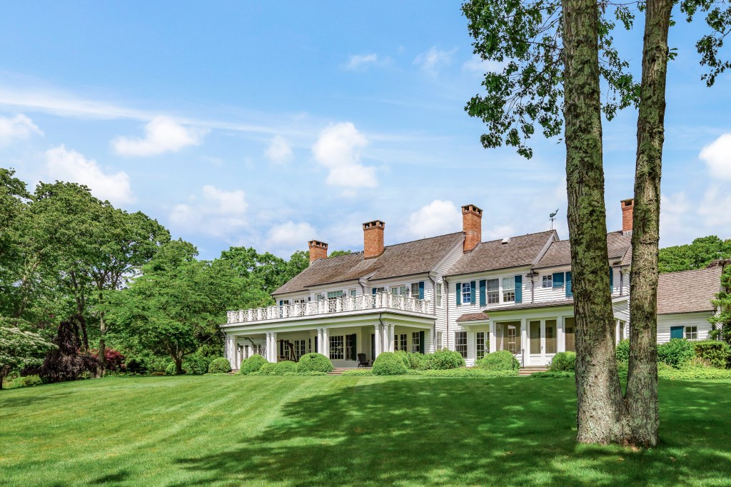 The Hamptons estate on Georgica Pond comes with rolling lawns on mature trees. 