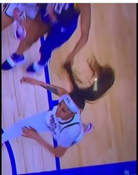 Angel Reese pulls the hair of Kamilla Cardoso during the SEC championship game on Sunday.