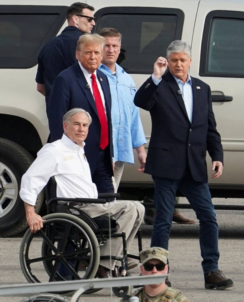 Republican presidential candidate and former U.S. President Trump walks with Texas Governor Greg Abbott and Fox News Channel host Sean Hannity at the U.S.-Mexico border at Eagle Pass.