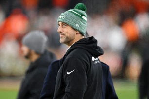 Aaron Rodgers #8 of the New York Jets looks on prior to playing the Cleveland Browns.