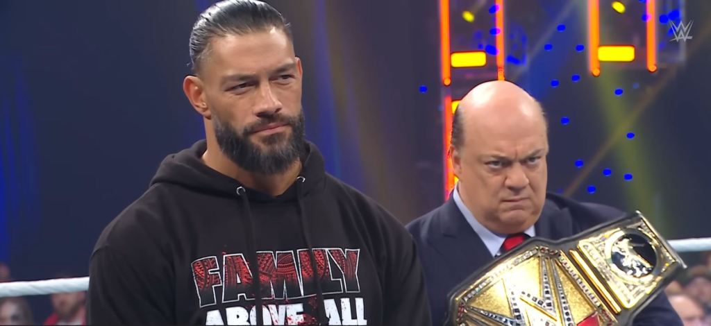 Roman Reigns and Paul Heyman listen to Cody Rhodes on WWE's "SmackDown" on March 22, 2024.