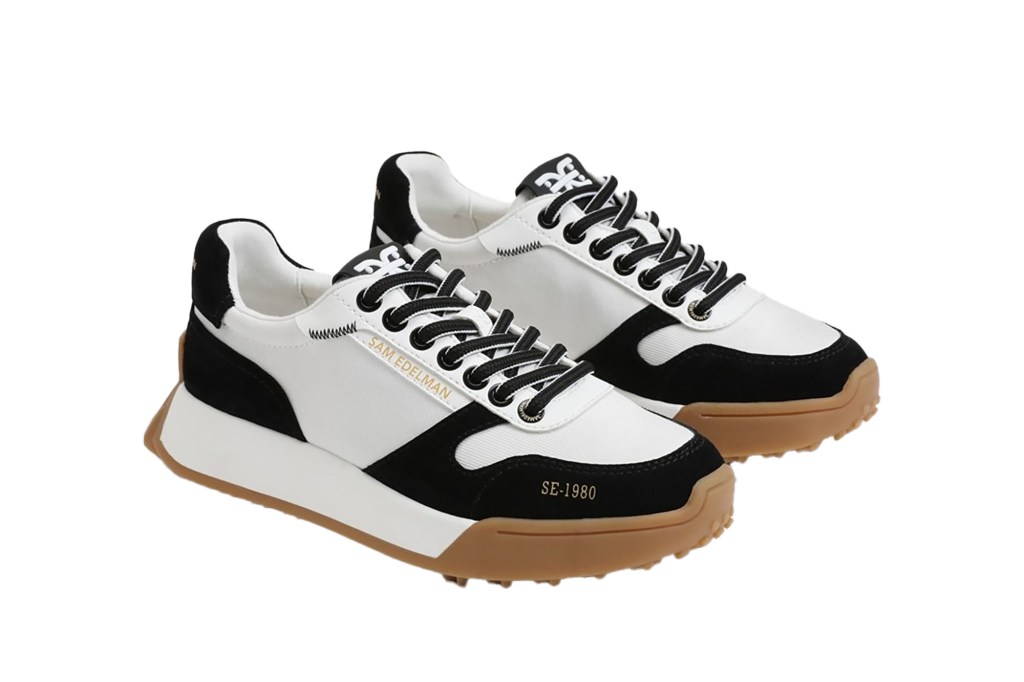 A pair of black and white sneakers.