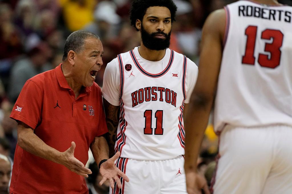 Houston head coach Kelvin Sampson talks to his players during the first half of an NCAA college basketball game against Iowa State in the championship of the Big 12 Conference tournament, Saturday, March 16, 2024, in Kansas City, Mo. 