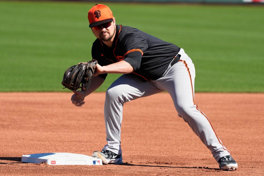 San Francisco Giants third baseman J.D. Davis was released after the team signed Matt Chapman. 