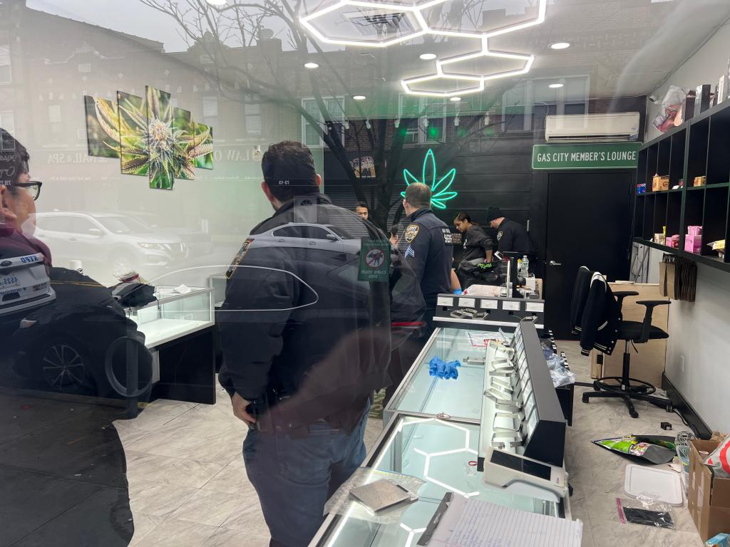 The illegal shop was decorated with images of marijuana leaves.