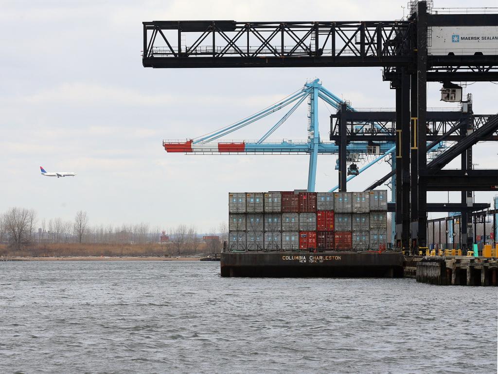 Shipping containers and cranes are seen in the Port of Newark, NJ.