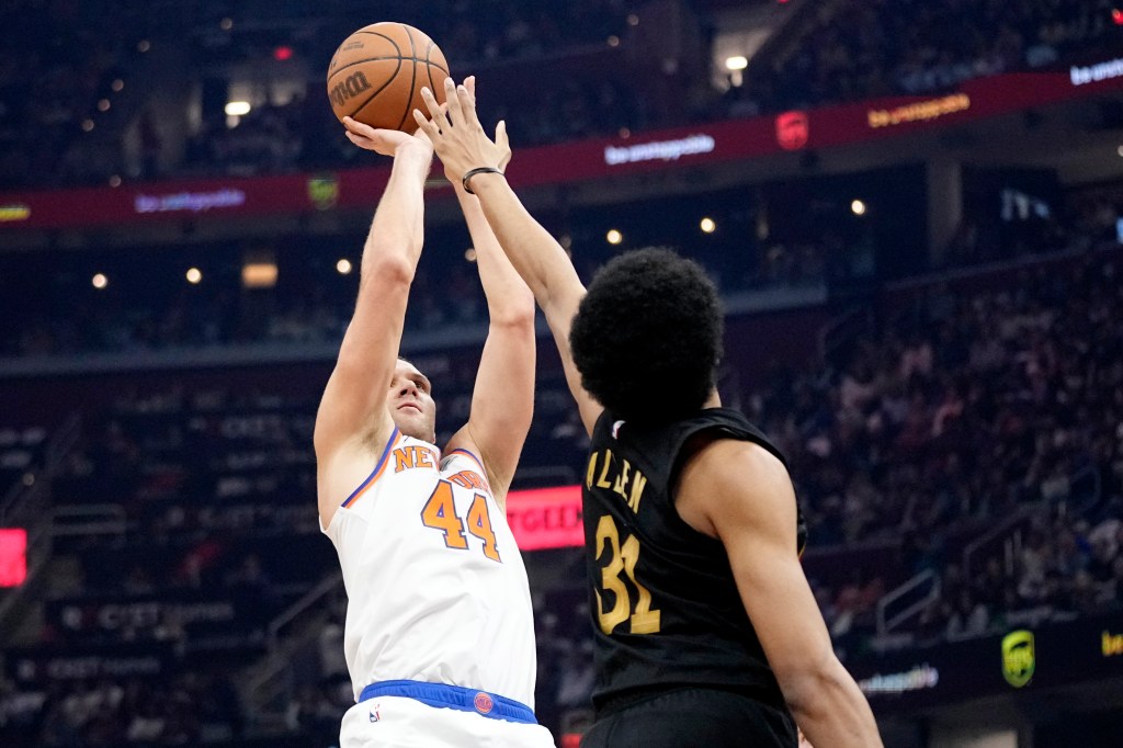 Bojan Bogdanovic (44) shoots as Cleveland Cavaliers center Jarrett Allen (31) defends in the first half.