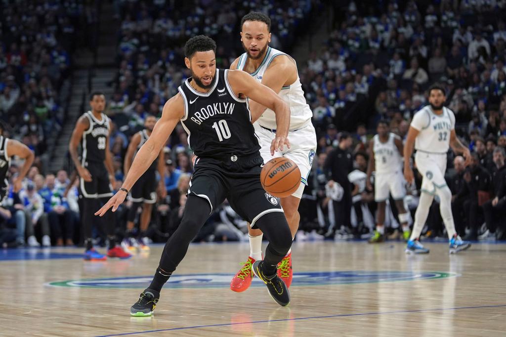 Brooklyn Nets guard Ben Simmons (10) loses control of the basketball as Minnesota Timberwolves forward Kyle Anderson defends during the first half of an NBA basketball game Saturday, Feb. 24, 2024, in Minneapolis. 