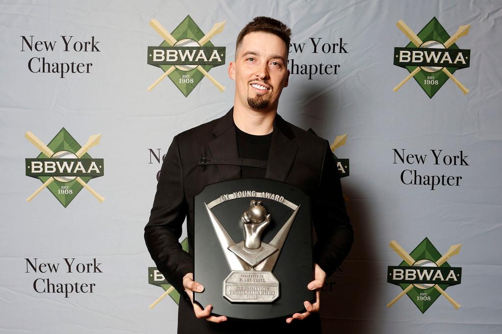 Former San Diego Padres pitcher Blake Snell poses with the 2023 National League Cy Young Award during the 2024 BBWAA Awards Dinner at New York Hilton Midtown on January 27, 2024 in New York City. 