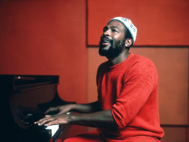 Soul singer Marvin Gaye playing piano in a studio, circa 1974