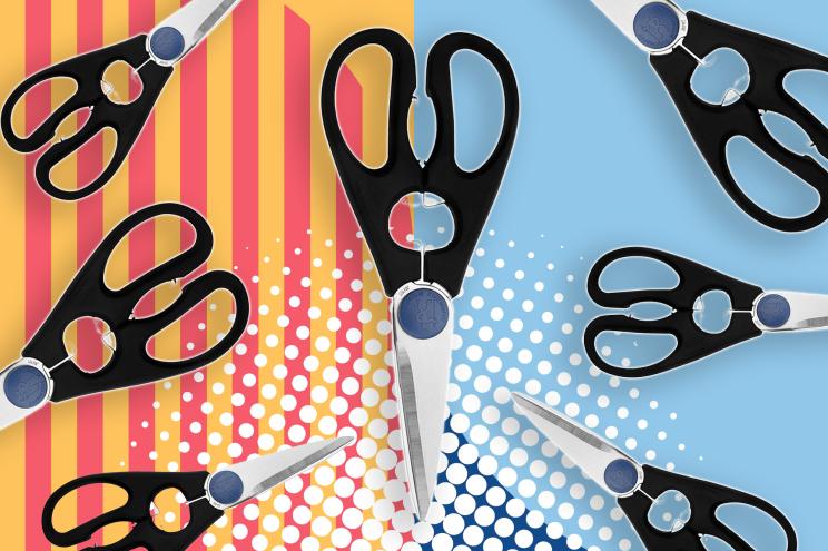 kitchen shears on abstract background