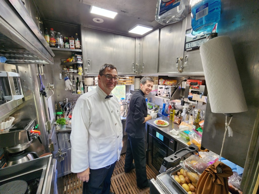 A photo of chefs preparing meals aboard the Blue Ridge Club.