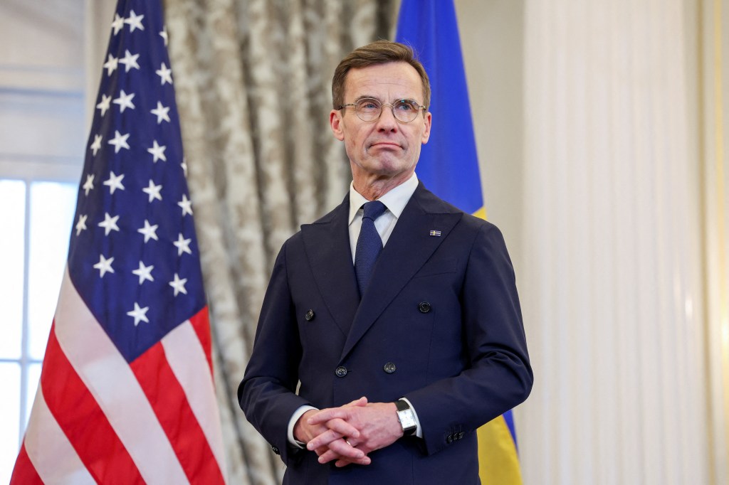 Swedish Prime Minister Ulf Kristersson listens to a speech on Sweden's entry into NATO at the State Department in Washington.