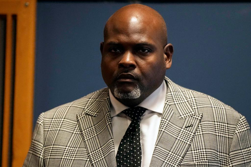 Terrence Bradley, Nathan Wadeâs former business partner and former divorce attorney  walks in the courtroom before meeting with Judge Scott McAfee in the Fulton County Courthouse, Monday, Feb. 26, 2024, in Atlanta. 