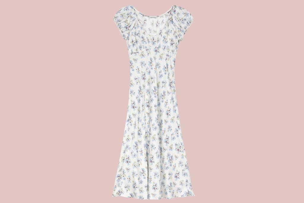 a white dress with a floral pattern