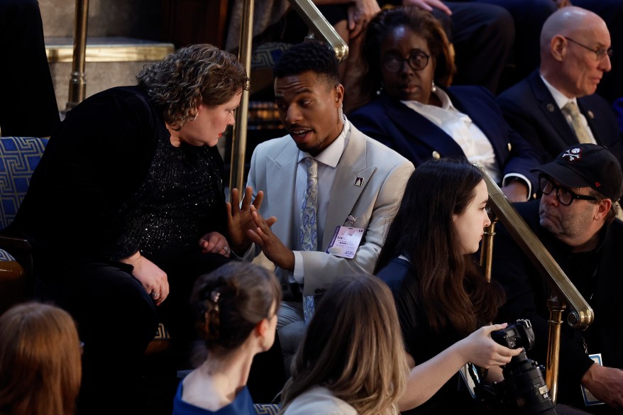 A US Capitol police officer warns an invited guest that she will be removed from the House chamber if she continues to be disruptive.