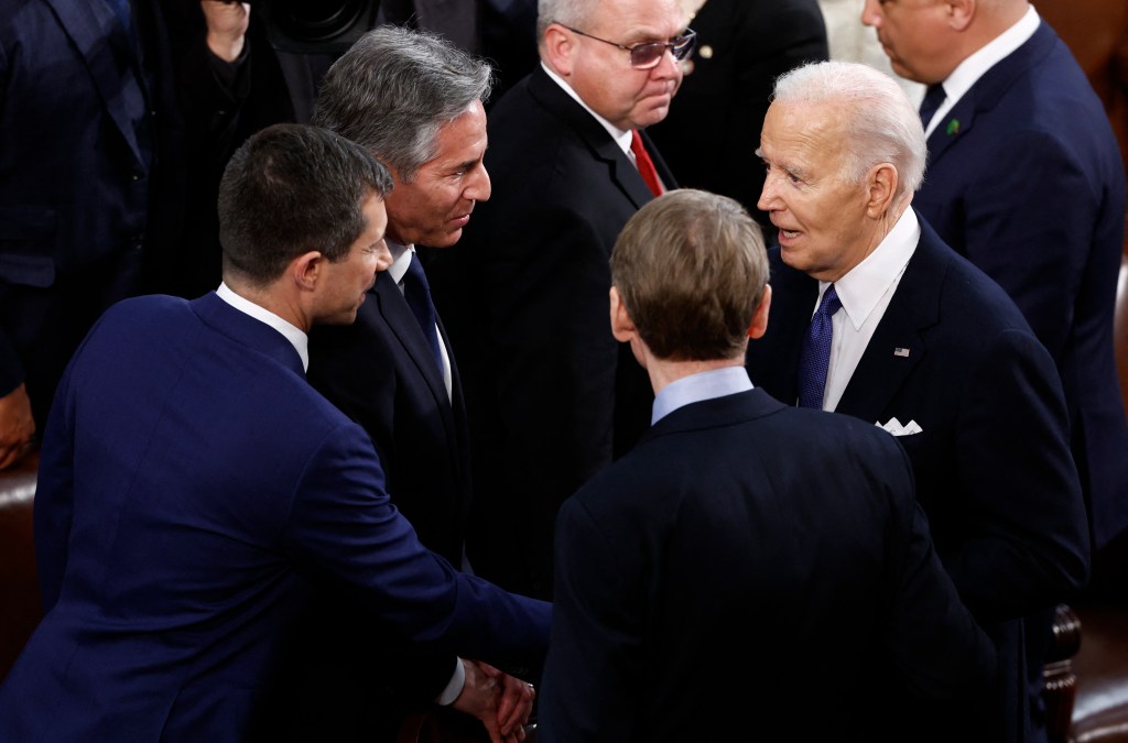 President Joe Biden was caught on hot mic talking with Senator Michael Bennet, Secretary of State Antony Blinken and US Transportation Secretary Pete Buttigieg.