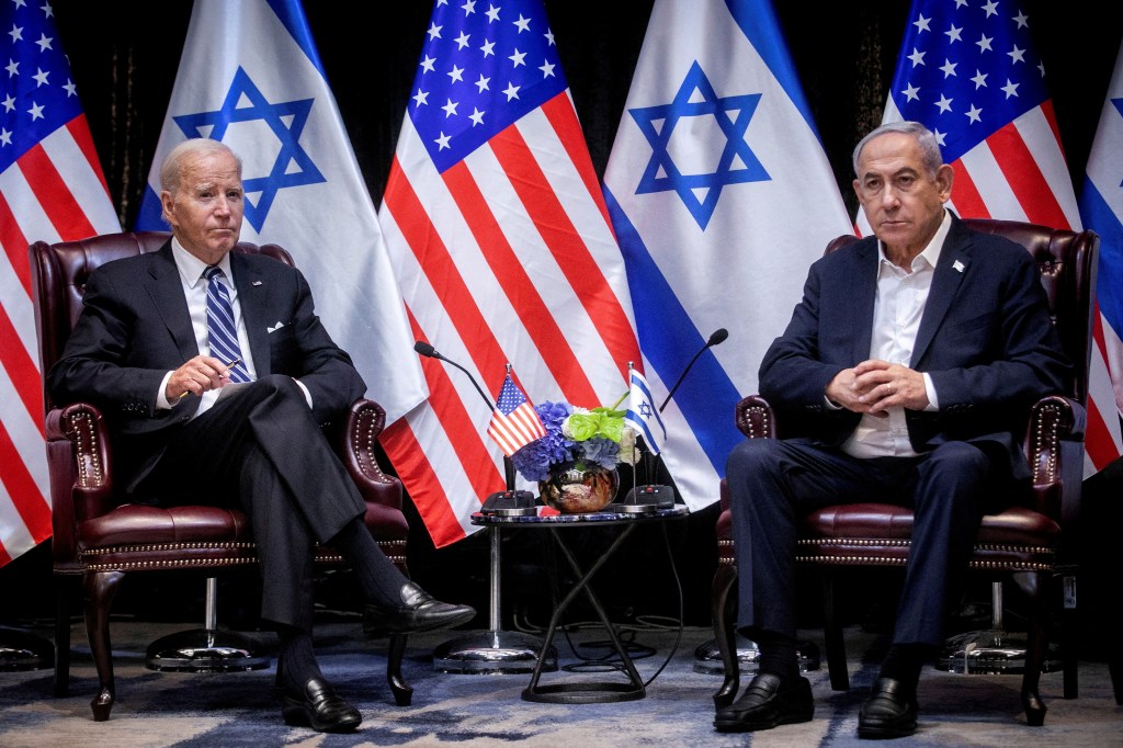 Biden, left, pauses during a meeting with Israeli Prime Minister Benjamin Netanyahu, right, to discuss the war between Israel and Hamas, in Tel Aviv, Israel, Wednesday, Oct. 18, 2023. 