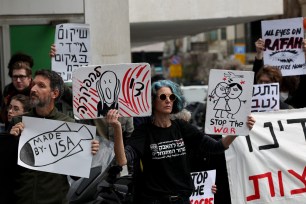 US and Israeli citizens gather in front of the US Embassy Branch Office in Tel Aviv to demand that the US stop arming Israel and an end to the war in the Gaza Strip.