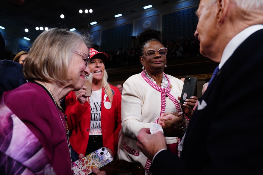 Joe Biden greeted by Marjorie Taylor Greene.