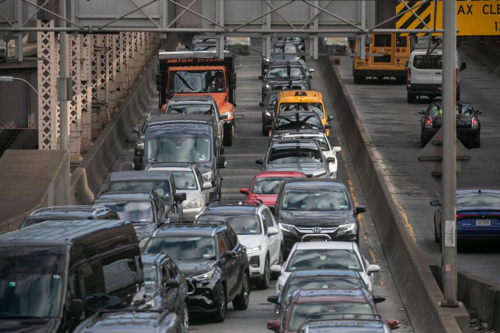 Vehicles exit the Ed Koch Queensboro Bridge i