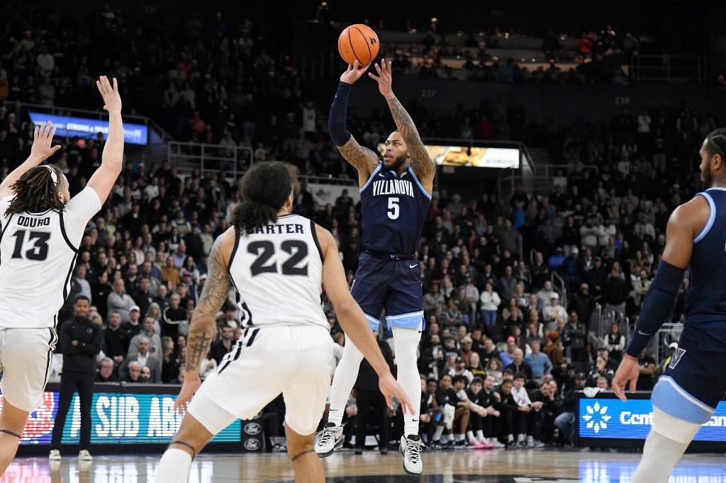 Villanova Wildcats guard Justin Moore shoots against the Providence Friars during the second half at Amica Mutual Pavilion.