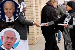 A woman hands out fliers outside a mosque urging voters not to vote for Biden after Friday prayers. Biden's face is not visible in the photo.