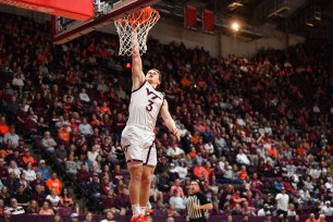 Virginia Tech Hokies guard Sean Pedulla (3) goes up for a dunk during a college basketball game between the Wake Forest Demon Deacons and the Virginia Tech Hokies.