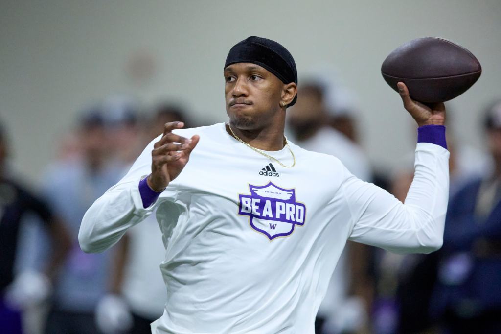 Washington quarterback Michael Penix Jr. passes during the NCAA college's NFL football pro day, Thursday, March 28, 2024