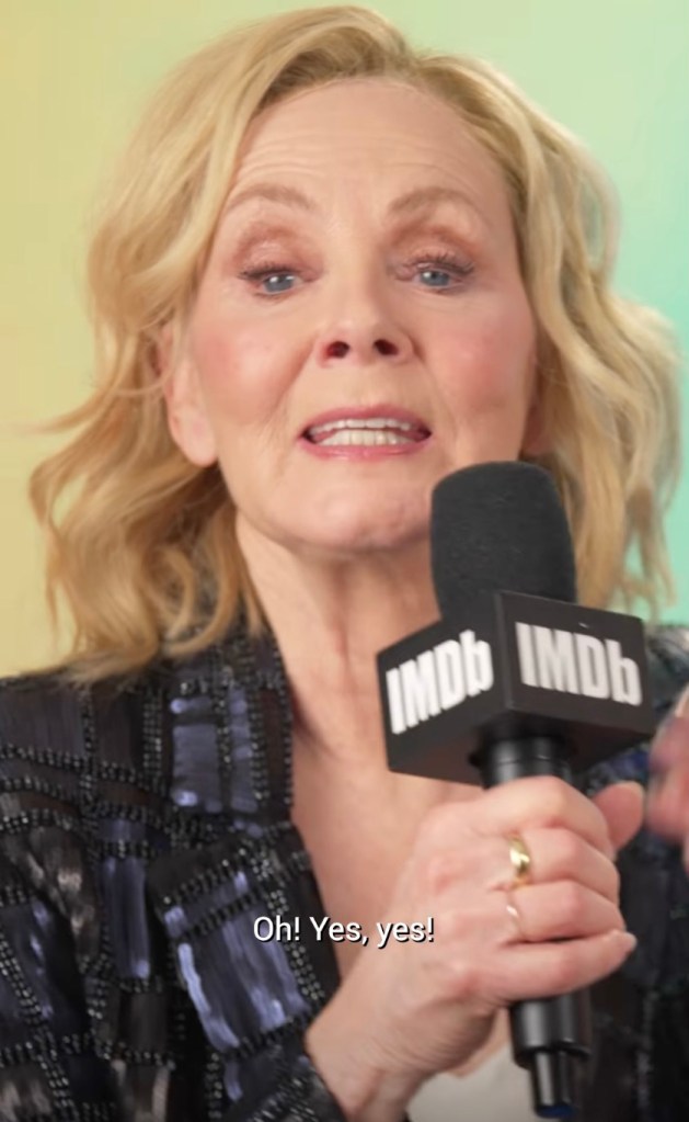 Jean Smart talking into a mic. 