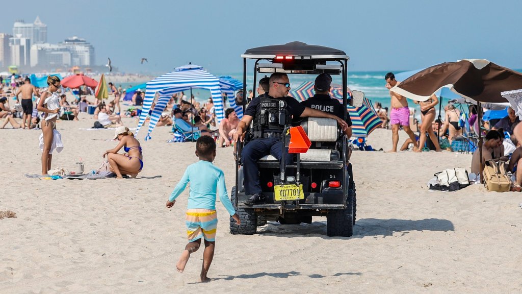 Police officers patrolling South Beach on March 9, 2024.