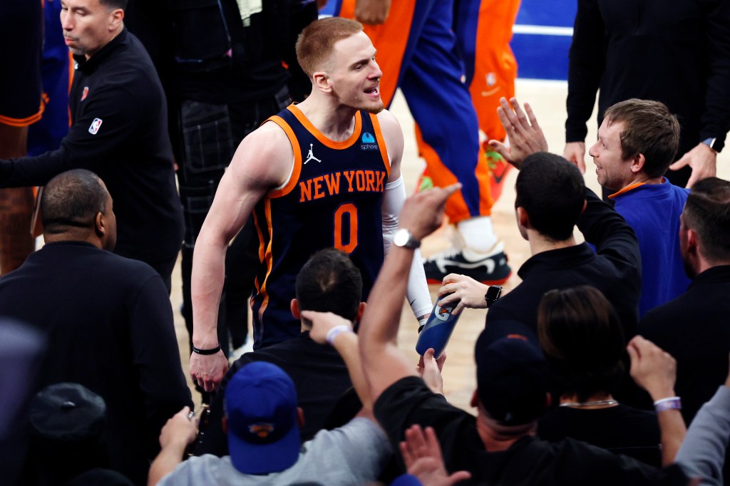 Donte DiVincenzo celebrates the Knicks' improbable Game 2 win on Monday.