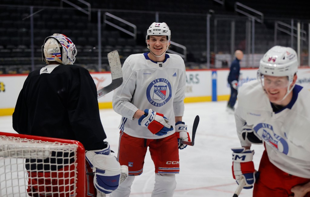 Rangers' Matt Rempe laughs alongside his teammates during an optional morning skate at Capital One Arena in Washington, DC, USA, April 27, 2024. 