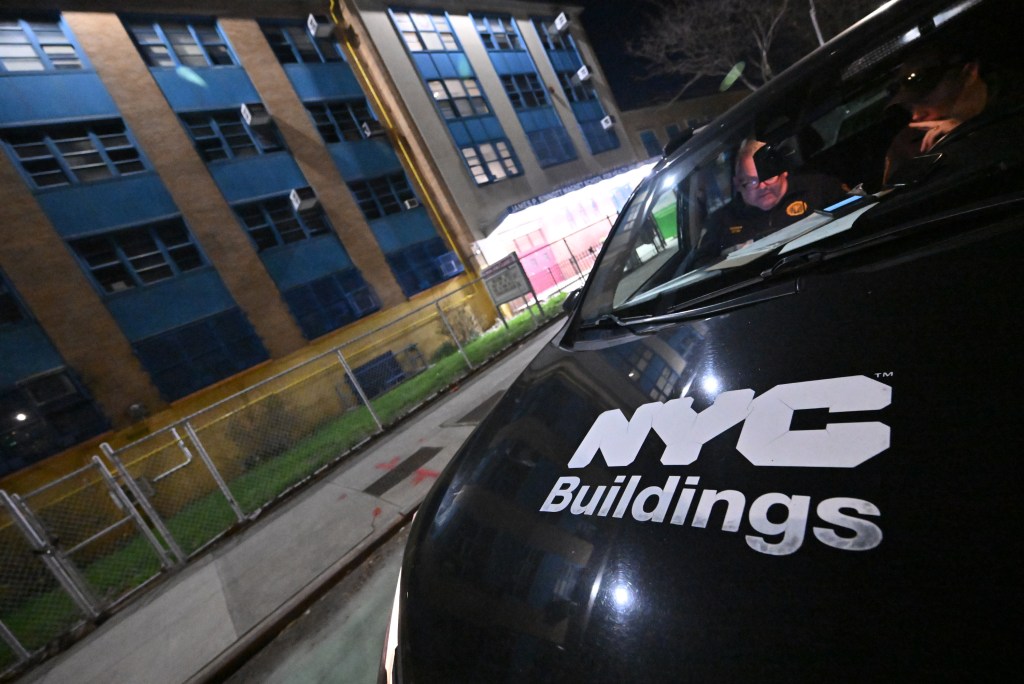 NYC Buildings car parked outside of Sinnot Magnet School in Brooklyn, New York.