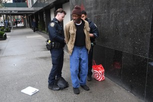 The NYPD arrest a man for shoplifting from the Upper East Side Target at the corner of 3rd Ave and 70th St.