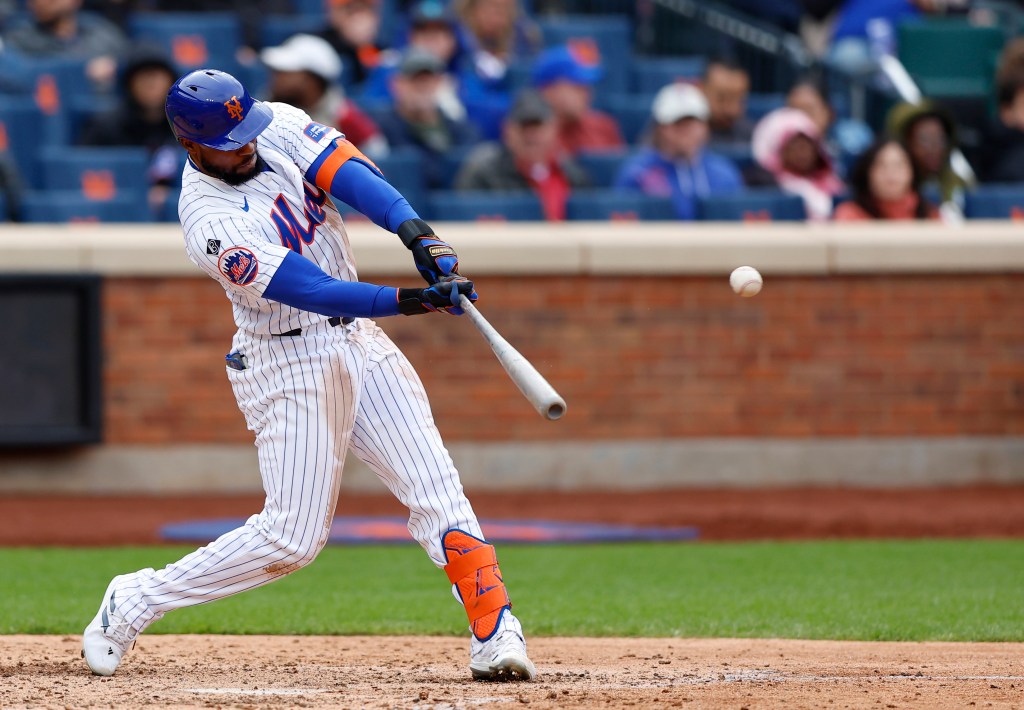 New York Mets outfielder Starling Marte (6) hits a home run against the Kansas City Royals during the. inning of baseball at Citi Field. 