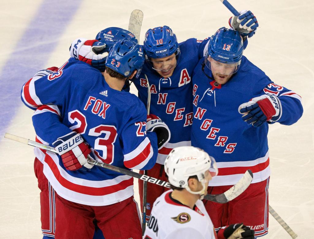 New York Rangers hockey team celebrating a goal by Artemi Panarin at Madison Square Garden