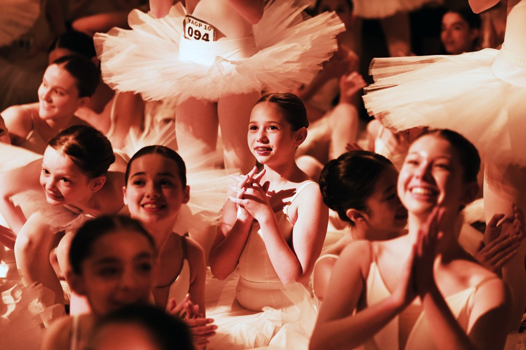 Hundreds of young ballet dancers simultaneously perched on their tippy toes — holding the grueling pose for a minute —  to set a new world record at the Plaza Hotel in Manhattan Wednesday.