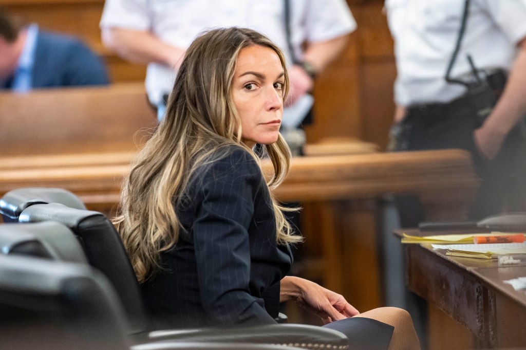 Karen Read sits with her legal team.