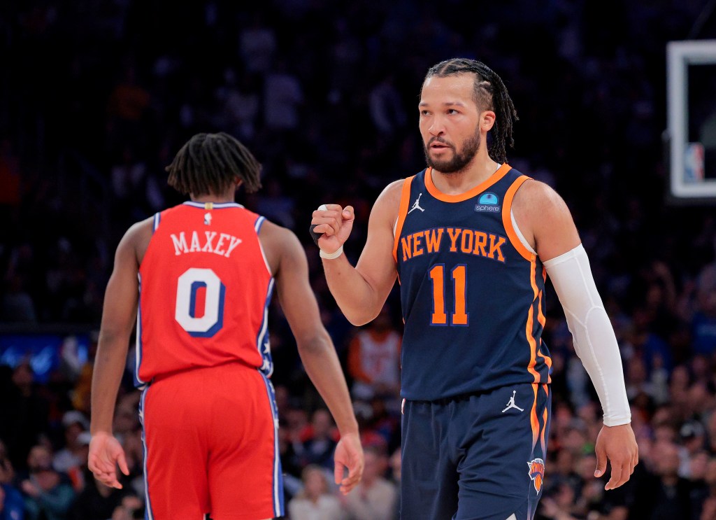 Jalen Brunson #11 reacts after he hits a shot during the third quarter.