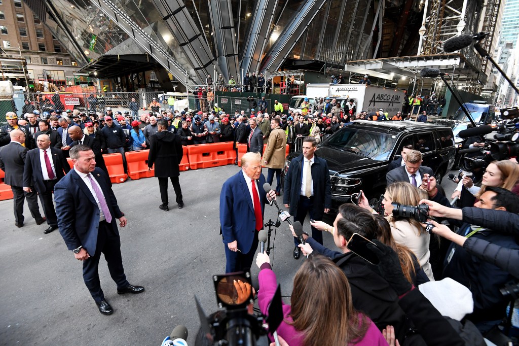 Donald Trump speaks to the media on the day he meets with Union workers in New York City.