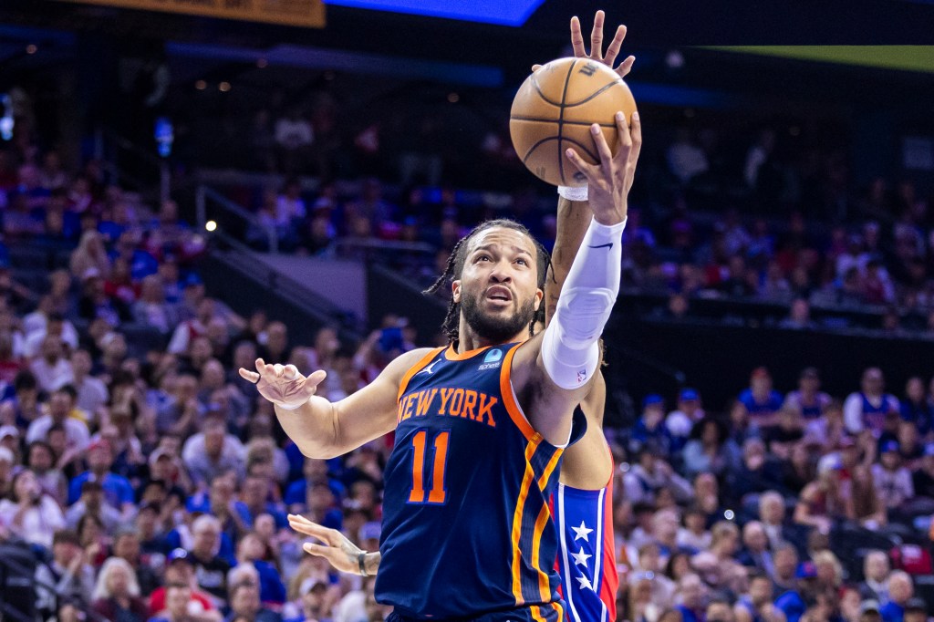 Knicks guard Jalen Brunson goes up for a shot against the 76ers in Game 4 on Sunday.