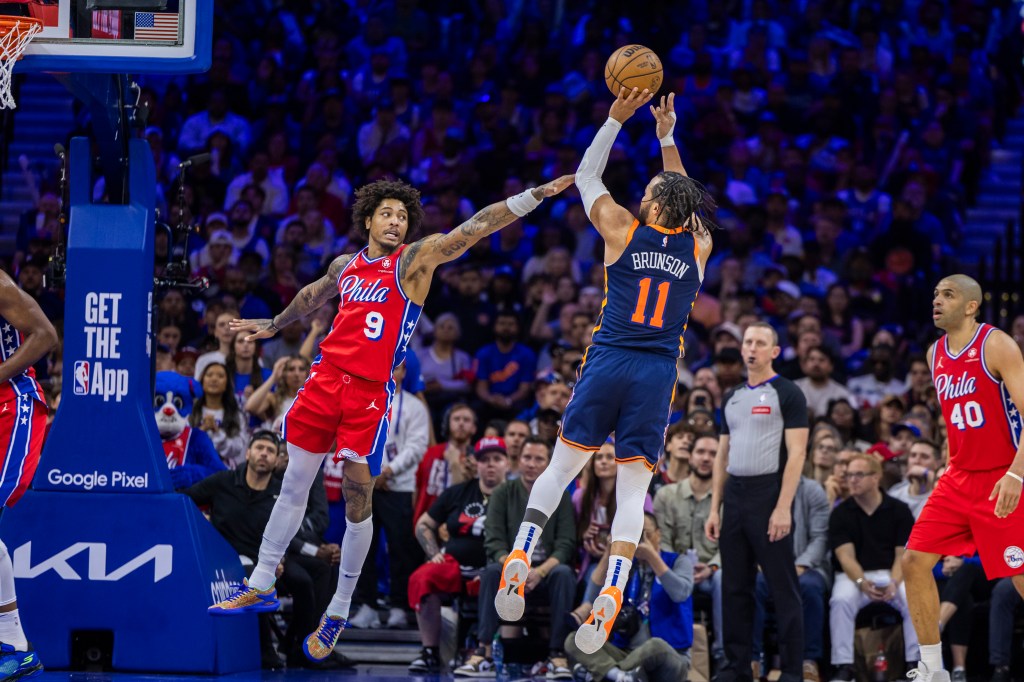 Jalen Brunson #11 of the New York Knicks puts up a shot as Kelly Oubre Jr. #9 of the Philadelphia 76ers is too late to defend in Game 4 of their first-round playoff series at Wells Fargo Center, Sunday, April 28, 2024, in Philadelphia, PA.  