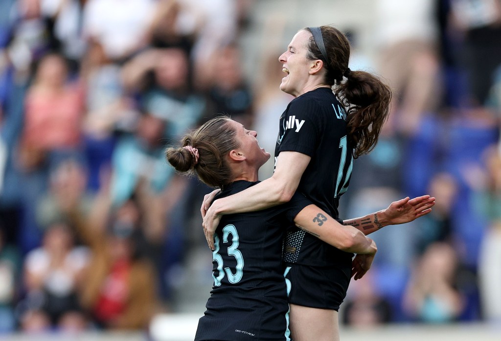 Rose Lavelle #16 of the NJ/NY Gotham FC celebrates her goal with teammate Sinead Farrelly #33 during the second half against the Racing Louisville FC at Red Bull Arens,