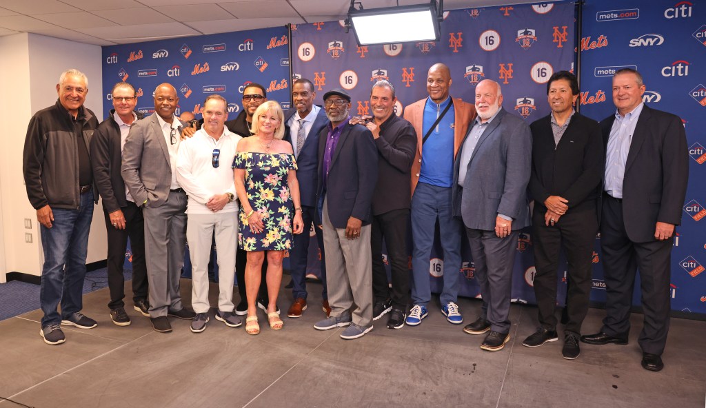 (l-r); 1986 Mets players Mike Torrez, Tim Teufel, Rafael Santana, Howard Johnson, Gary Sheffield, Sandra Lahm, Gary Carterâs wife, Dwight Gooden, Mooklie Wilson, Lee Mazzilli, Darryl Strawberry, Barry Lyons, Jesse Orosco, and Roger McDowell, posing for a photo during a press conference at Citi Field.