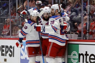 Chris Kreider of the New York Rangers scores a goal during the first period of Game 4 on Sunday.