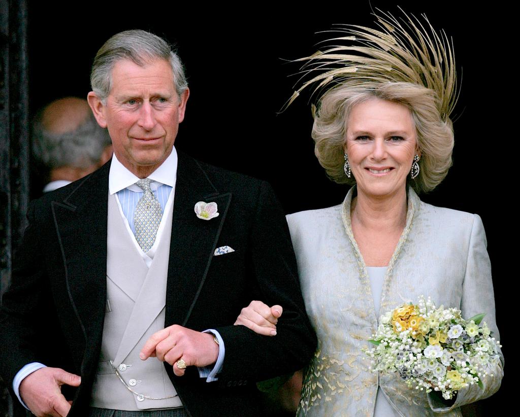 Prince Charles and Camilla Duchess of Cornwall in formal attire, leaving St George's Chapel in Windsor, England, after their wedding ceremony on April 9, 2005.