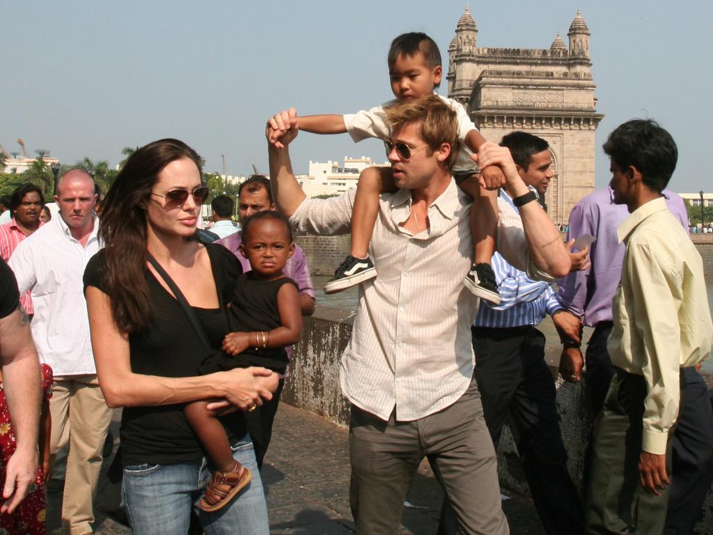 Angelina Jolie  with daughter Zahara, Brad Pitt, and son Maddox. 