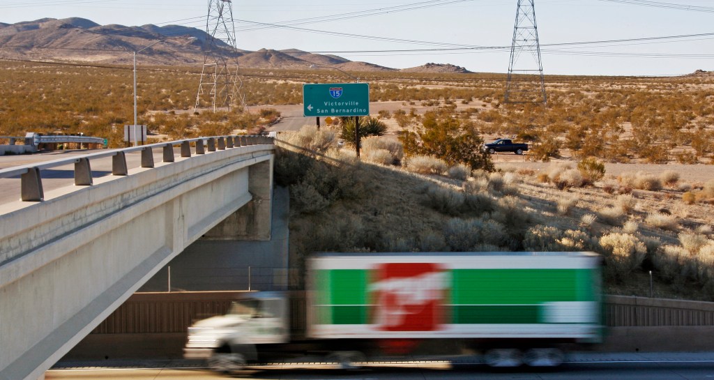 Proposed station site for a high-speed rail line to Las Vegas, located at the end of the Dale Evans Parkway exit from Interstate 15, with a truck driving on the road.