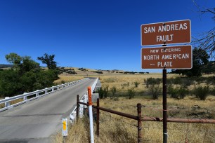 A bridge crosses over the San Andreas Fault from the Pacific to the North American tectonic plates 